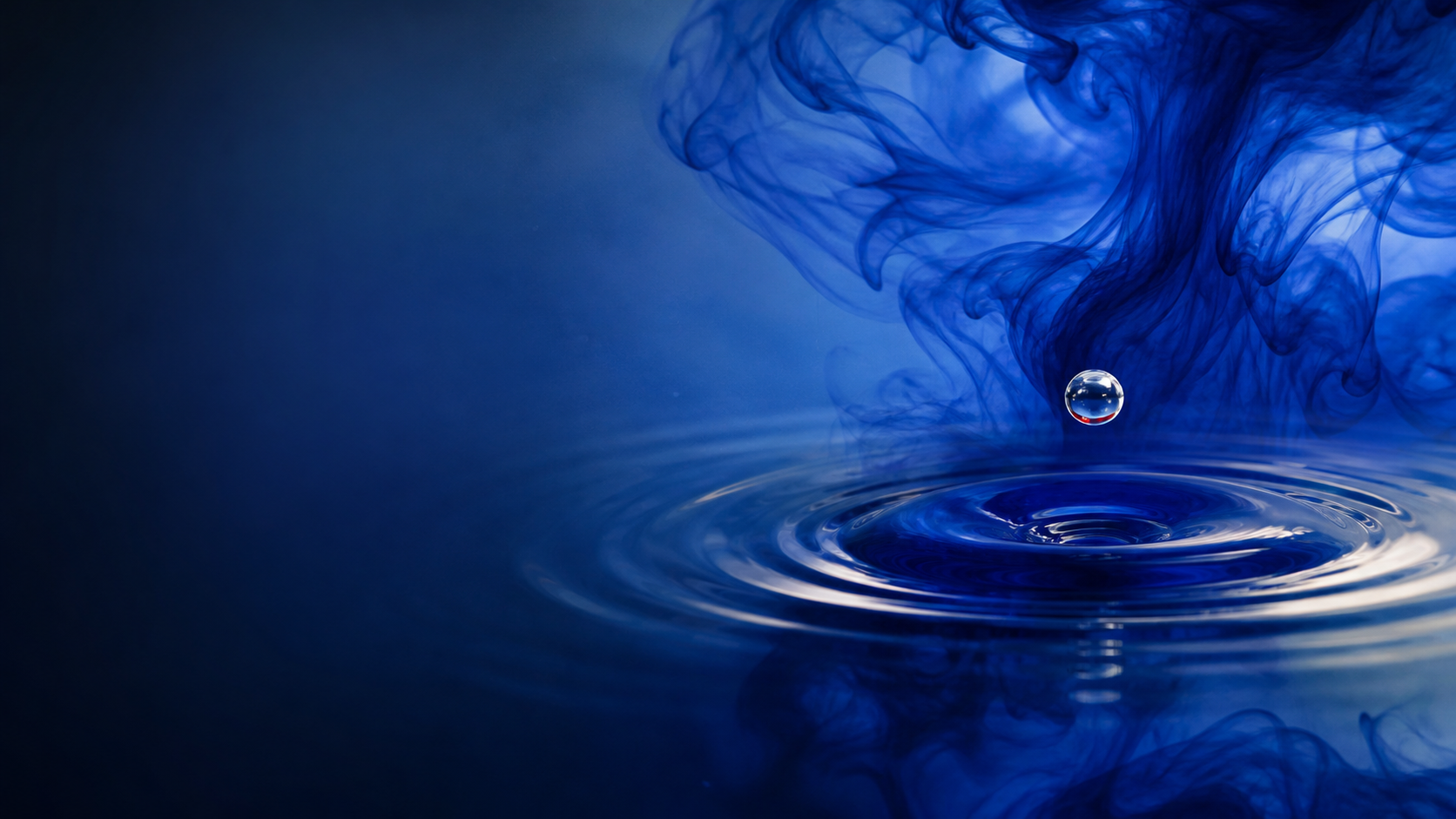 A single droplet meeting still water, the Antosh mark